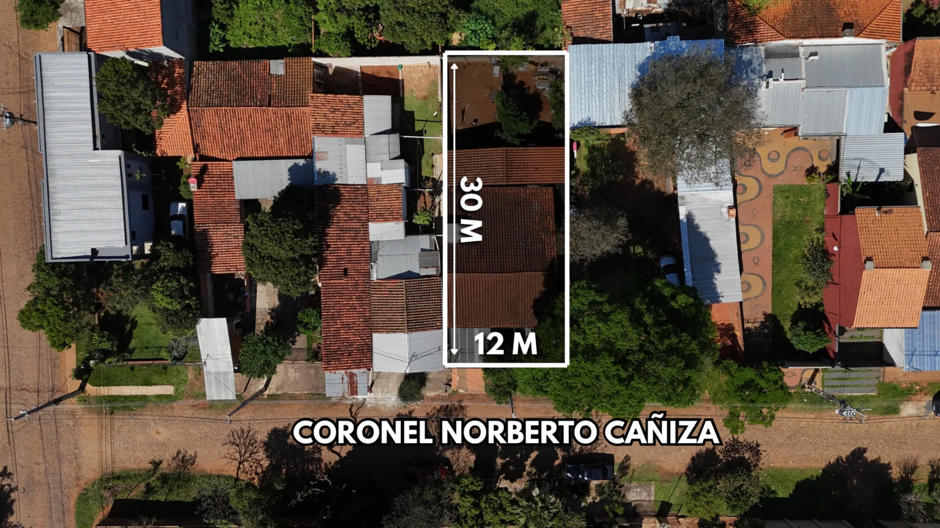 VENDO TERRENO CON DOS CASAS EN SAN LORENZO